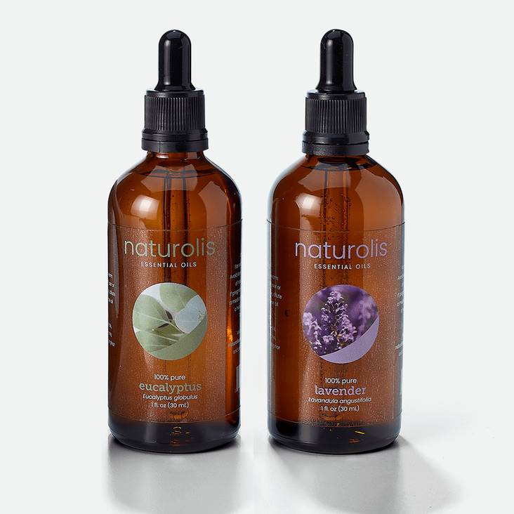 two tincture bottles with clear labels printed by StickerGiant applied to them one is a eucalyptus clear label and the other a lavender clear label