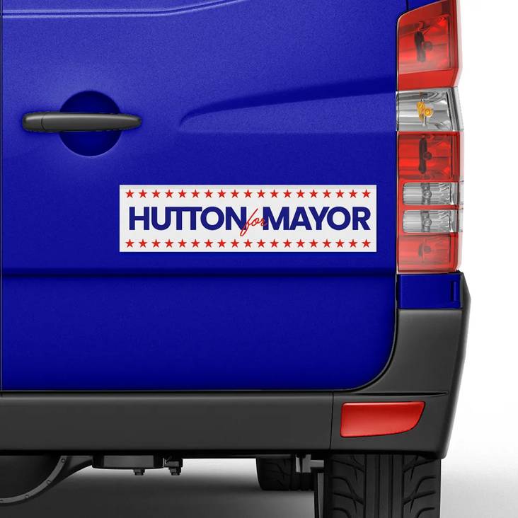 Back of blue car with bumper sticker printed by StickerGiant that says Hutton for Mayor