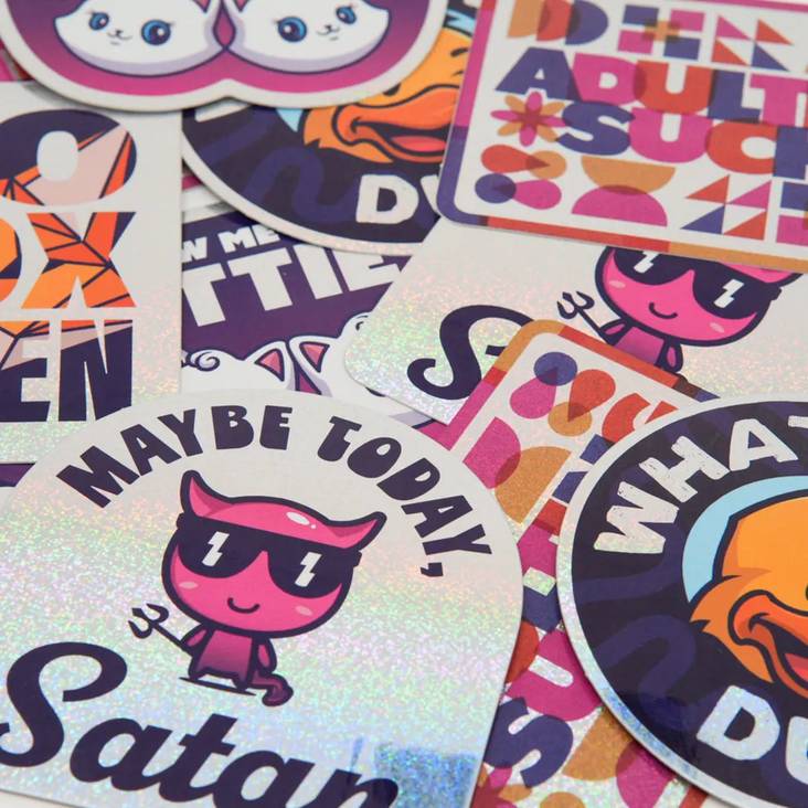 A collage of glitter stickers printed by StickerGiant