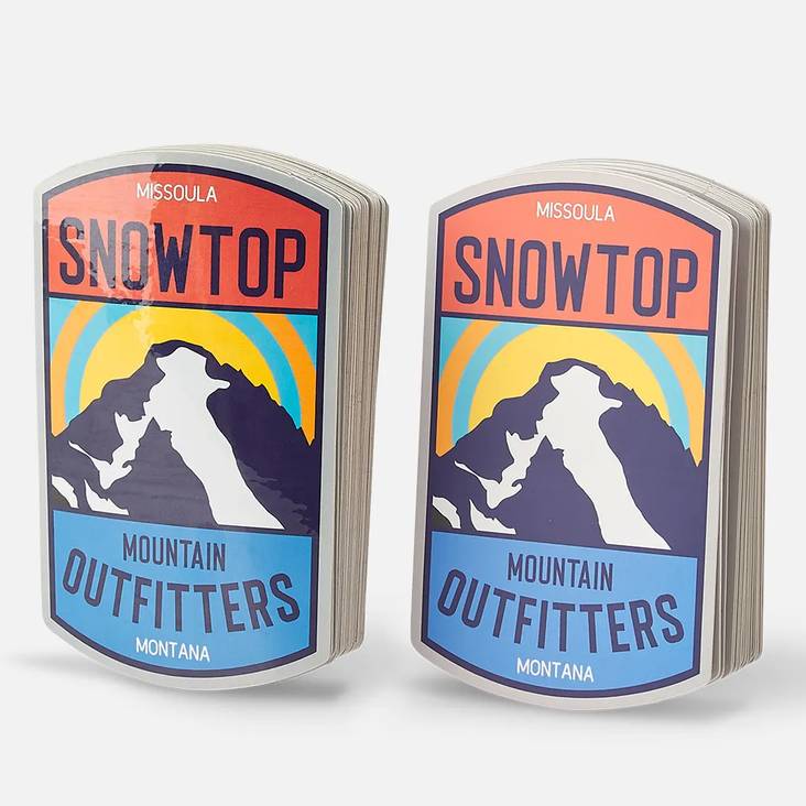 Two stacks of Snowtop Mountain Outfitters die cut stickers printed by StickerGiant