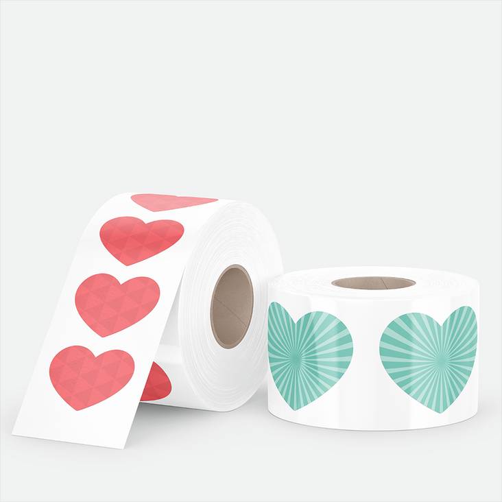 two rolls of kiss cut stickers printed by StickerGiant with hearts printed on them