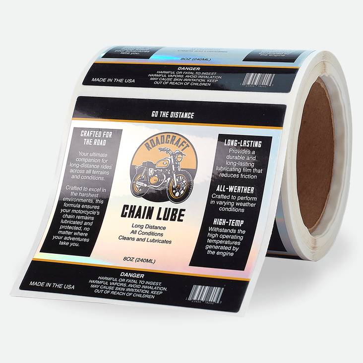 A roll of Roadcraft chain lube holographic labels printed by StickerGiant