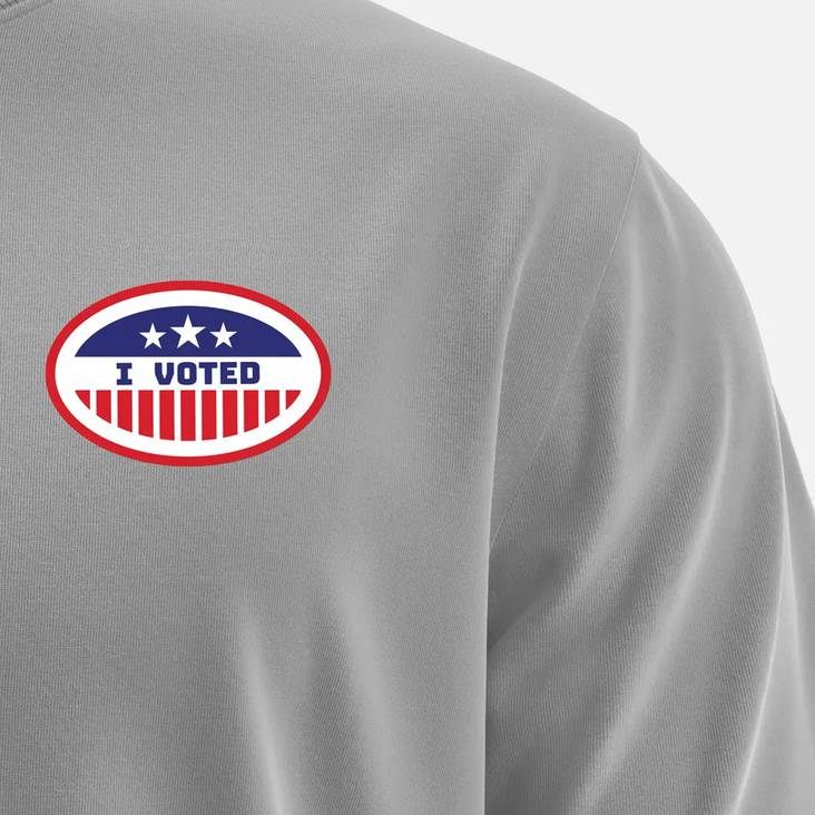 Gray shirt with an I Voted oval sticker printed by StickerGiant applied to it