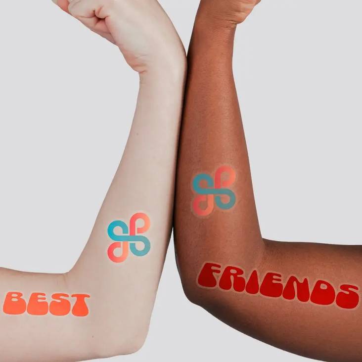 Two arms with Waterless Tattoos printed by StickerGiant applied to each arm